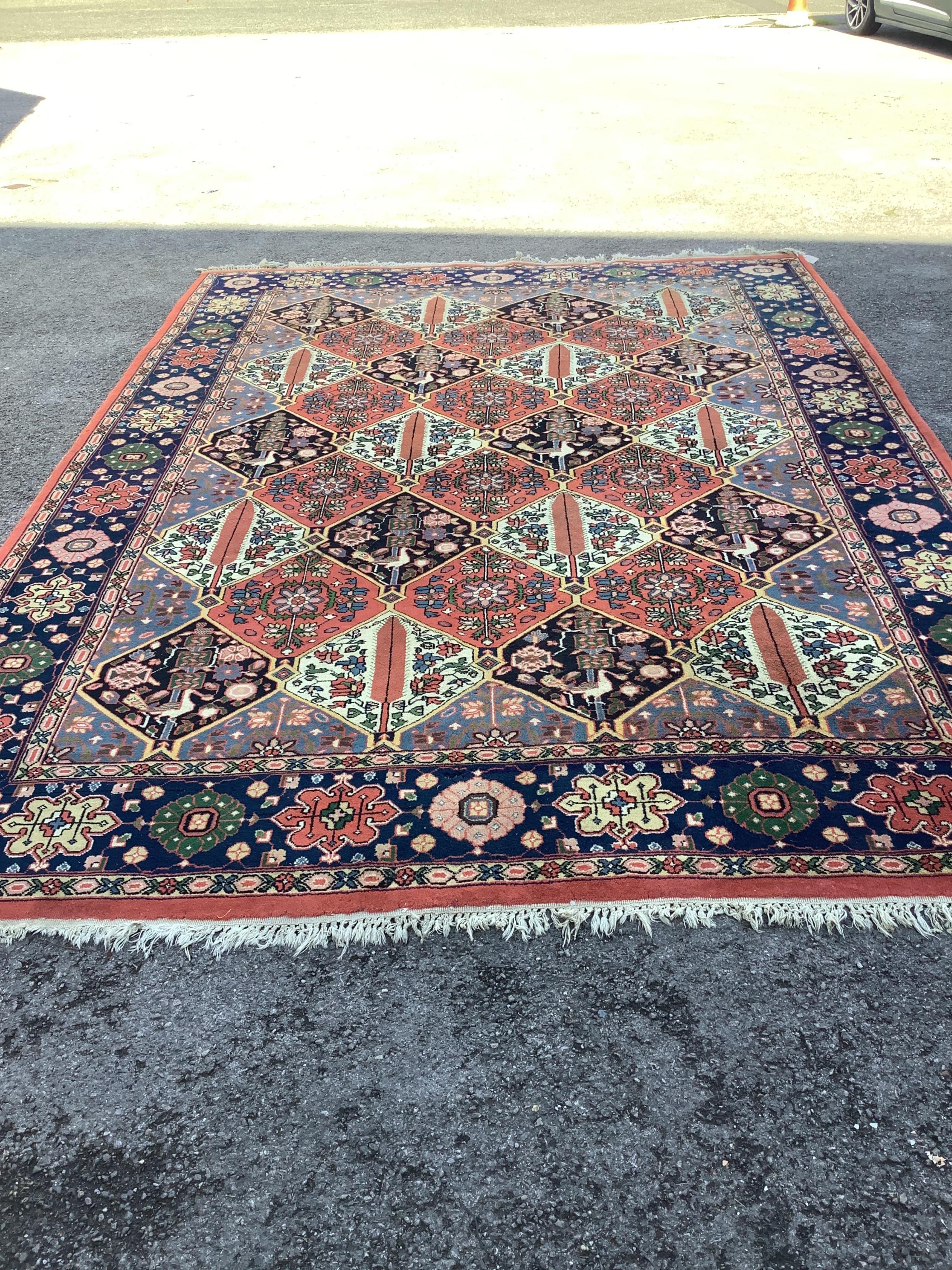 A Caucasian style brick red ground carpet, approximately 350cm x 150cm condition fair.